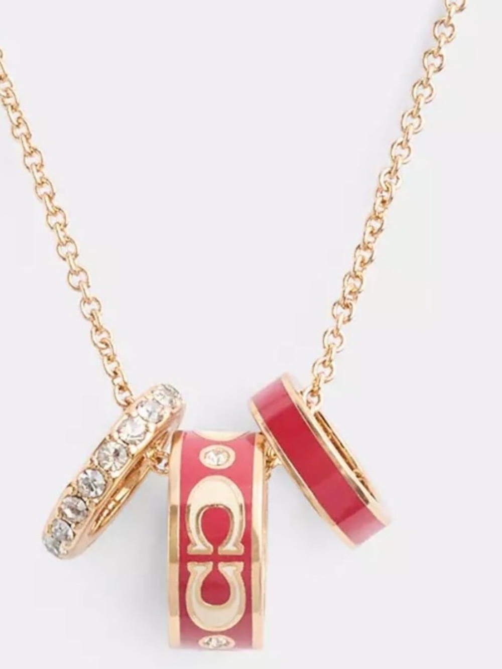 Authentic Coach  Multi-Ring Pendant Necklace with Red Enamel Accent